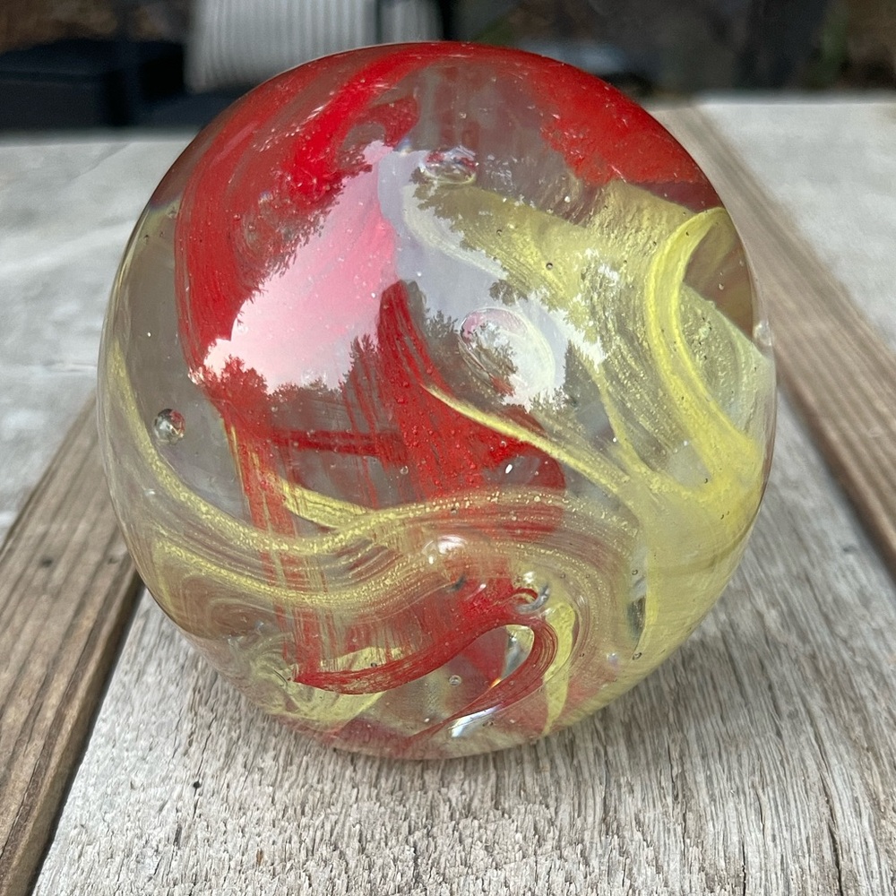 Hand-Blown Glass Art Sphere Paperweight with Red and Yellow Swirls